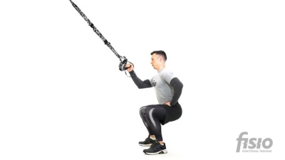 Упражнение на функциональных тренировочных петлях Приседания (широкое положение стоп) (одна рука)