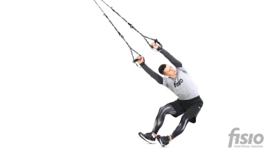 Упражнение на функциональных тренировочных петлях Вытяжения низа спины с вращением